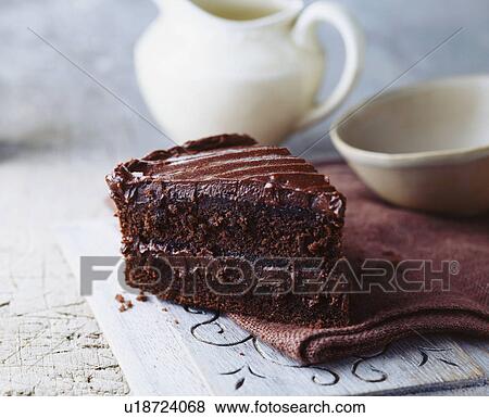 Chocolate sponge cake View Large Photo Image Stock Photo - Chocolate sponge cake. Fotosearch