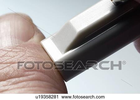 Stock Image - Cholesterol home test. Fotosearch