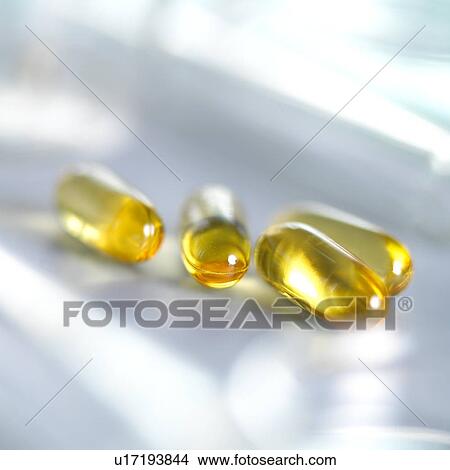 Picture - Cod liver oil capsules. Fotosearch