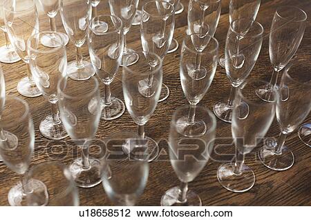 Collection of empty champagne flutes View Large Photo Image Stock Image - Collection of empty champagne flutes. Fotosearch