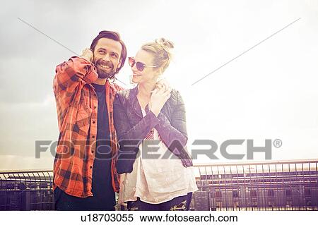 Cool mid adult couple on rooftop parking lot View Large Photo Image Stock Photography - Cool mid adult couple on rooftop parking lot. Fotosearch
