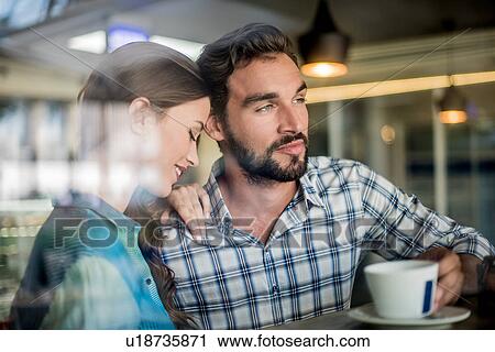 Couple at cafe window seat, Dubai, United Arab Emirates View Large Photo Image Stock Image - Couple at cafe window seat, Dubai, United Arab Emirates. Fotosearch