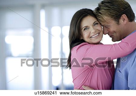Stock Image - Couple embracing. Fotosearch