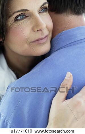 Couple embracing View Large Photo Image Stock Image - Couple embracing. Fotosearch