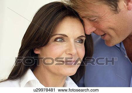 Stock Image - Couple embracing. Fotosearch