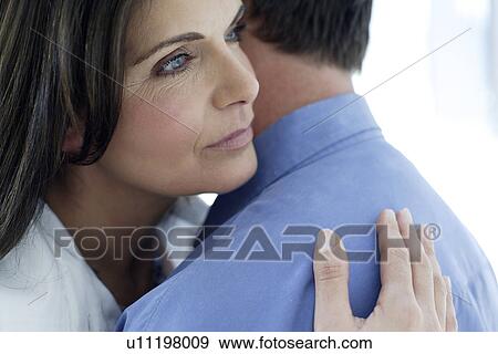 Couple embracing View Large Photo Image Stock Photo - Couple embracing. Fotosearch