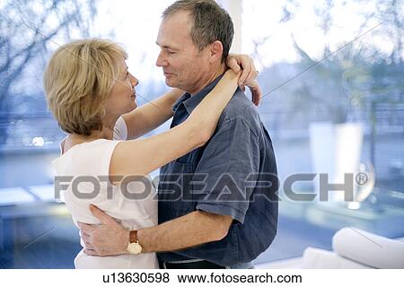 Stock Photo - Couple embracing. Fotosearch