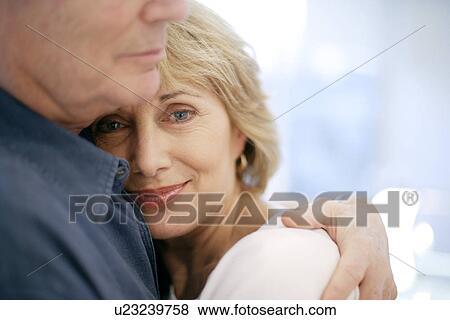 Stock Photo - Couple embracing. Fotosearch