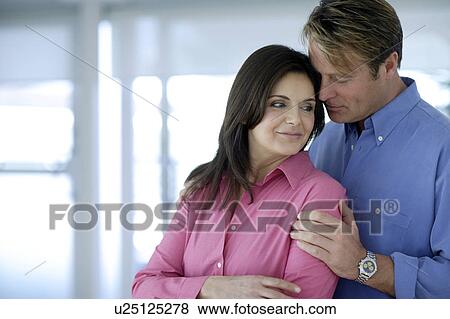 Stock Photo - Couple embracing. Fotosearch