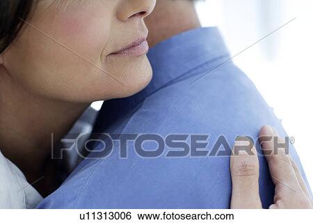 Stock Photograph - Couple embracing. Fotosearch