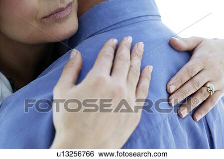 Stock Photograph - Couple embracing. Fotosearch