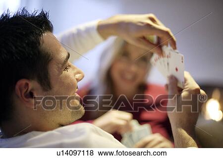 Couple playing cards View Large Photo Image Stock Photo - Couple playing cards. Fotosearch