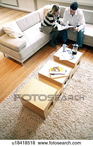 Stock Photo - Couple reading. Fotosearch