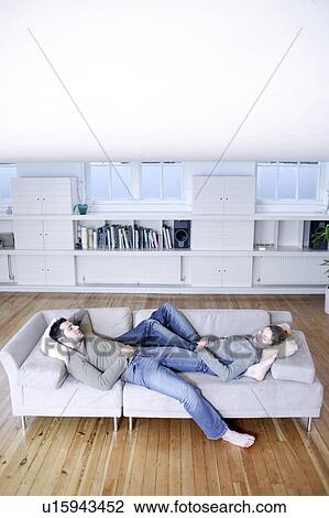 Stock Image - Couple relaxing. Fotosearch