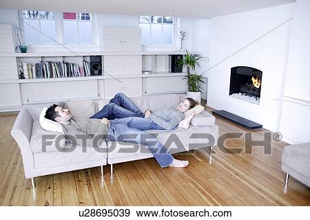 Stock Photo - Couple relaxing. Fotosearch
