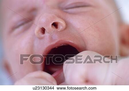 Picture - Crying baby boy. Fotosearch