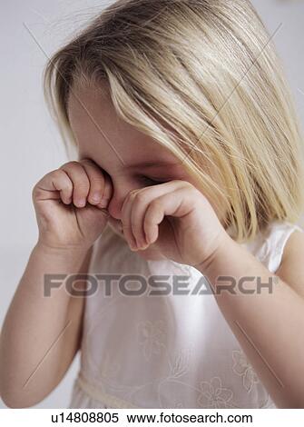 Stock Photography - Crying young girl. Fotosearch