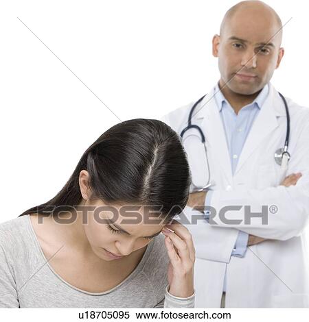 Depressed teenage girl and doctor View Large Photo Image Stock Photography - Depressed teenage girl and doctor. Fotosearch