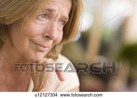 Picture - Depressed woman. Fotosearch