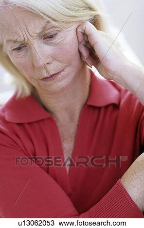 Stock Image - Depressed woman. Fotosearch