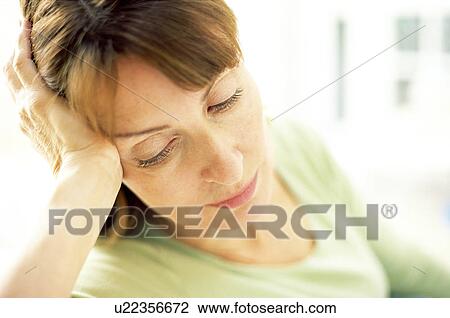 Stock Image - Depressed woman. Fotosearch