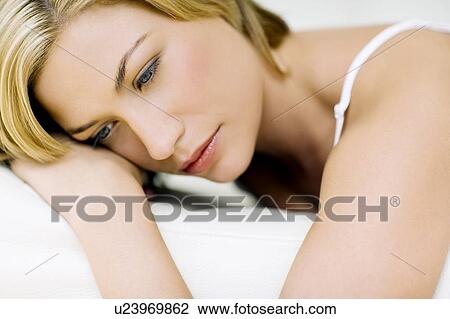Stock Image - Depressed woman. Fotosearch
