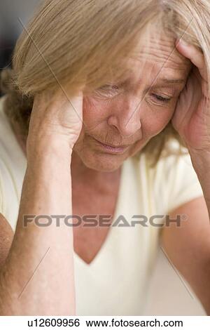 Stock Photograph - Depressed woman. Fotosearch