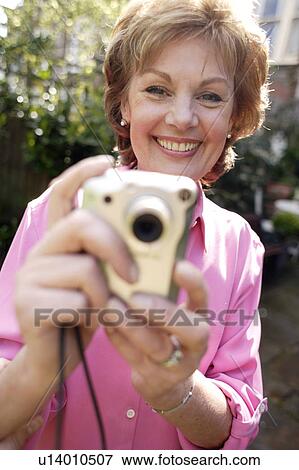 Digital camera use View Large Photo Image Stock Photo - Digital camera use. Fotosearch