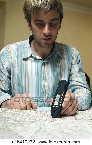 Stock Image - Digital map measurer. Fotosearch