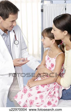 Doctor and child View Large Photo Image Picture - Doctor and child. Fotosearch