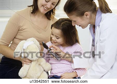 Doctor and child playing View Large Photo Image Stock Image - Doctor and child playing. Fotosearch