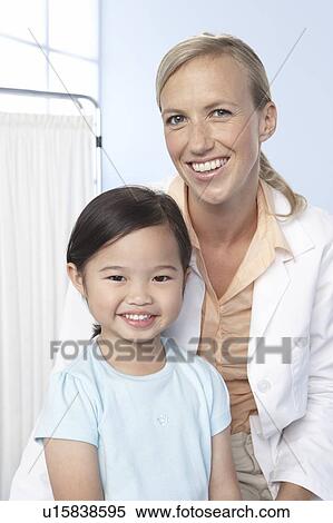 Doctor and child View Large Photo Image Stock Photography - Doctor and child. Fotosearch