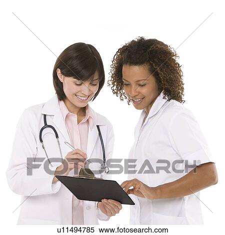 Stock Photography - Doctor and nurse. Fotosearch