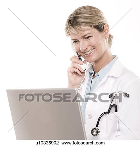 Stock Image - Doctor on the phone. Fotosearch