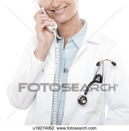 Doctor on the phone View Large Photo Image Stock Image - Doctor on the phone. Fotosearch