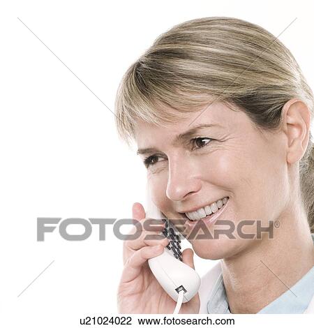 Stock Image - Doctor on the phone. Fotosearch