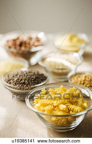 Stock Image - Dried pasta and other ingredients. Fotosearch
