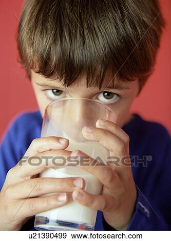 Drinking milk View Large Photo Image Stock Photo - Drinking milk. Fotosearch