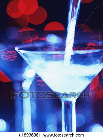 Dry martini cocktail being poured View Large Photo Image Stock Image - Dry martini cocktail being poured. Fotosearch