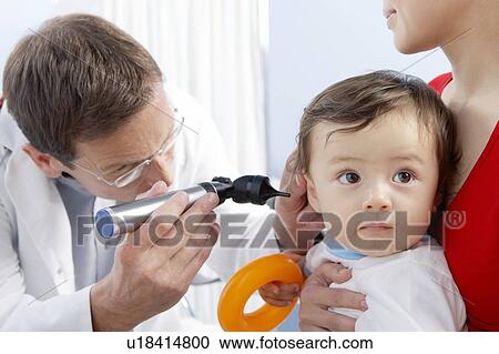 Ear examination View Large Photo Image Stock Image - Ear examination. Fotosearch