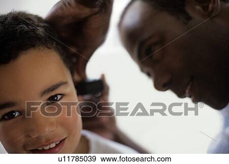 Stock Photo - Ear examination. Fotosearch
