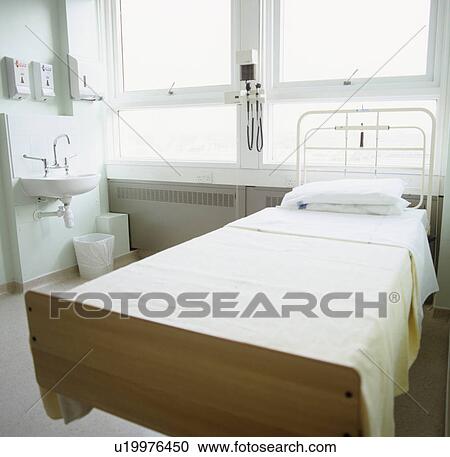 Empty hospital bed View Large Photo Image Stock Image - Empty hospital bed. Fotosearch
