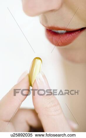 Stock Photography - Evening primrose supplement. Fotosearch