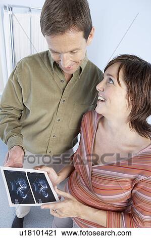 Stock Image - Expectant parents. Fotosearch