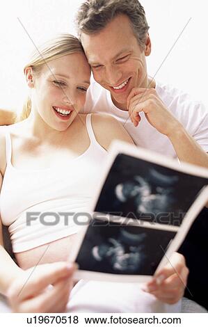 Stock Photo - Expectant parents. Fotosearch