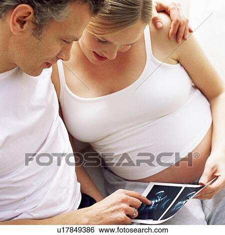 Stock Photograph - Expectant parents. Fotosearch