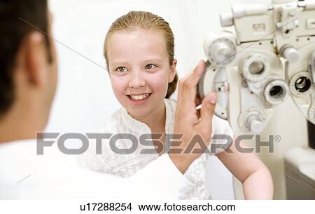 Picture - Eye examination. Fotosearch