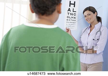 Stock Image - Eye examination. Fotosearch