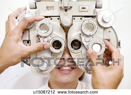 Stock Image - Eye examination. Fotosearch