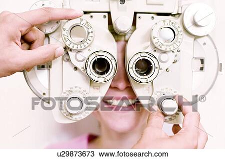Stock Image - Eye examination. Fotosearch